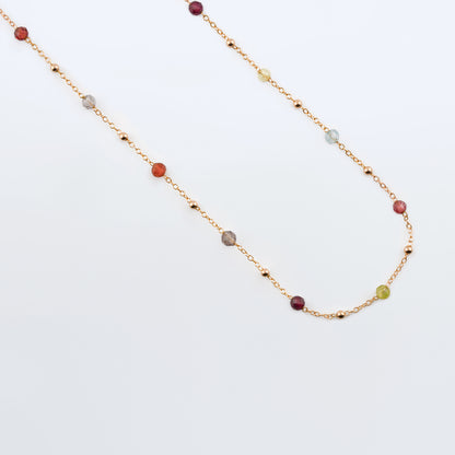Estelle dainty high quality natural multi-colored gemstone beaded chain adjustable necklace 14K gold filled, top view with plain background closer view. Featuring high quality AAA Apatite, Agate, Citrine, Garnet, Labradorite, Obsidian, Peridot gemstones.